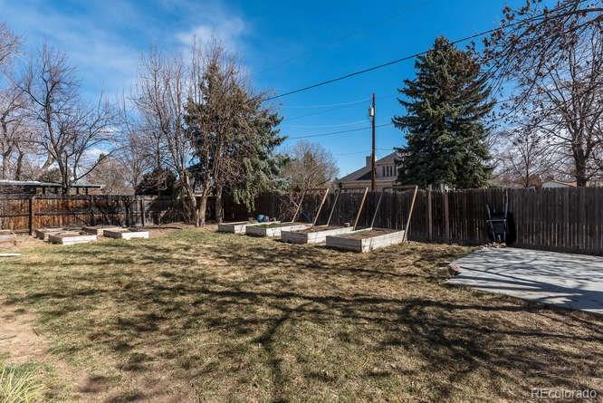 3520 Ward Road Wheat Ridge, CO 80033 - Photo 21 of 22 a view of a yard with a house