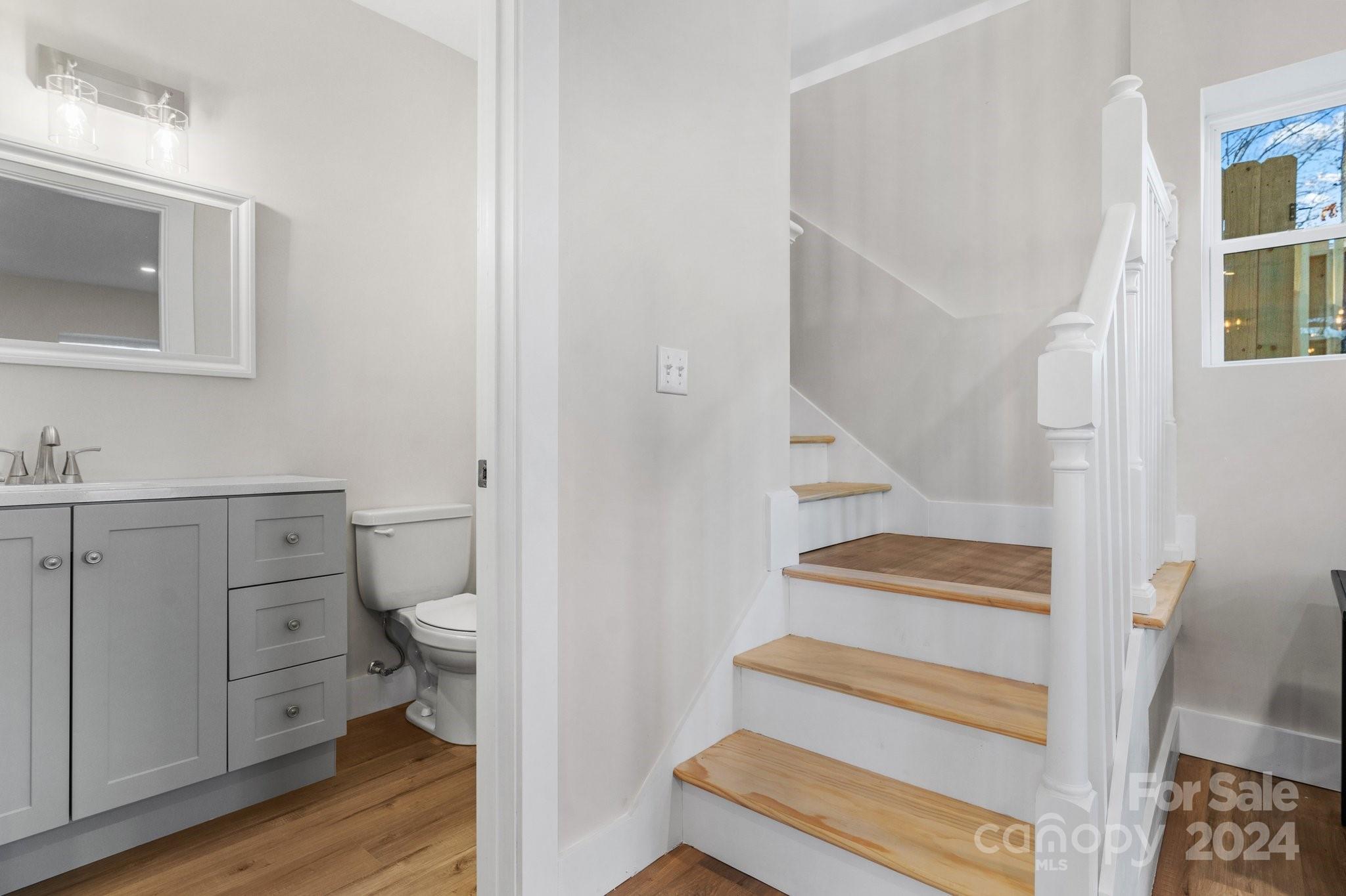 32 Access Road Black Mountain, NC 28711 - Photo 18 of 34 a view of a bathroom with toilet and a sink