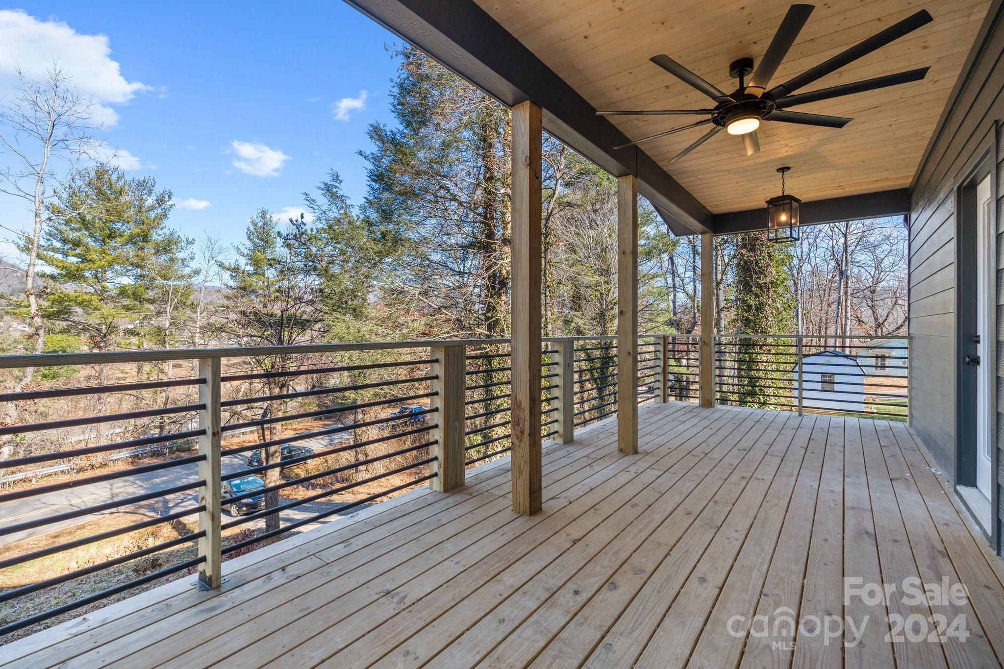 32 Access Road Black Mountain, NC 28711 - Photo 19 of 34 a view of outdoor space with deck and wooden floor