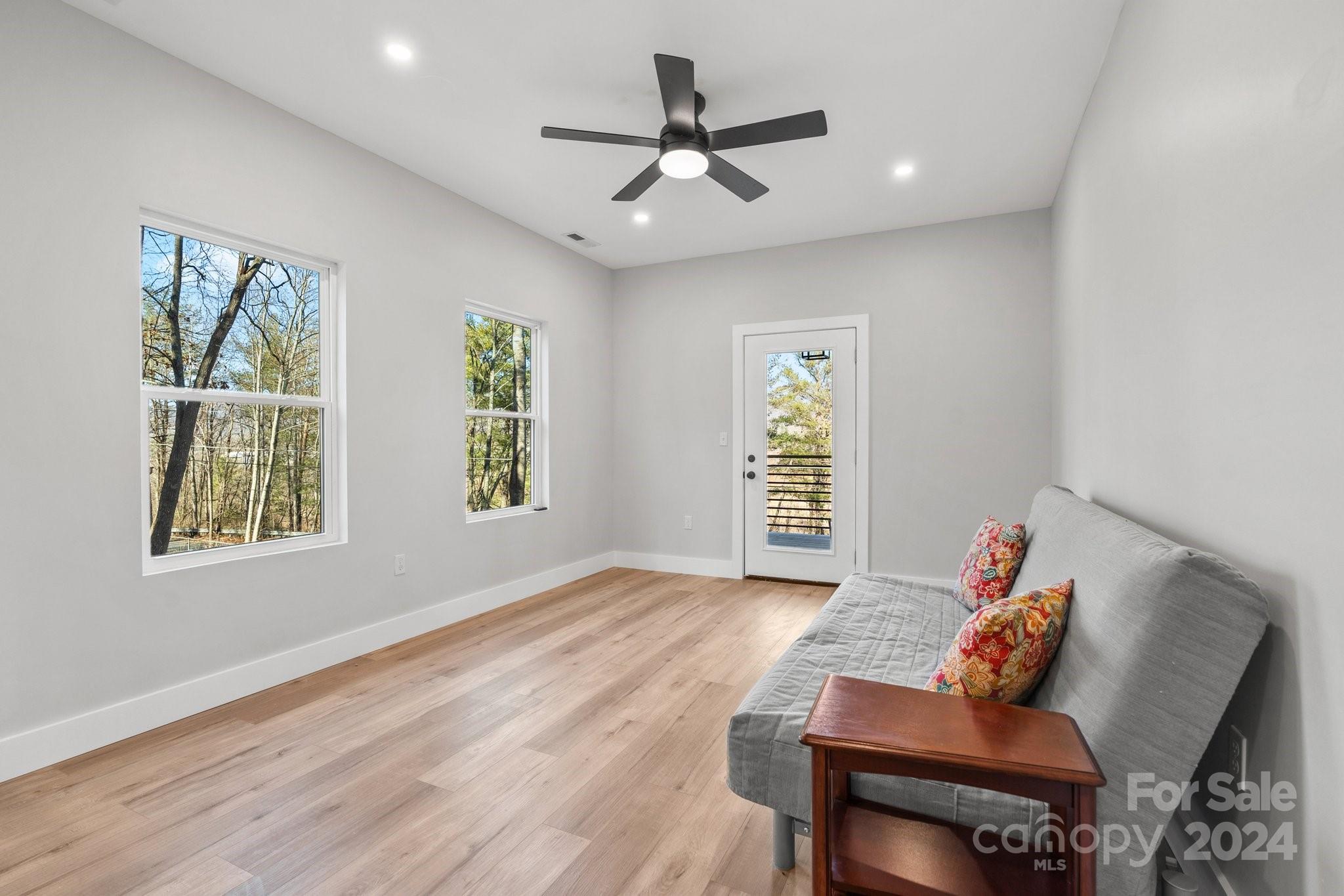 32 Access Road Black Mountain, NC 28711 - Photo 21 of 34 a living room with furniture and a window