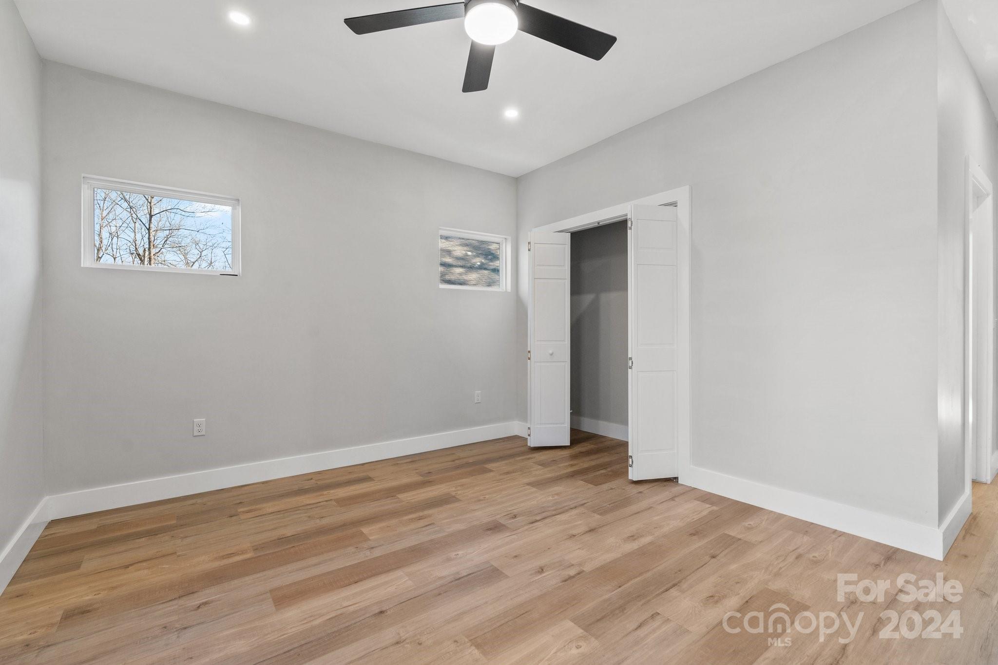 32 Access Road Black Mountain, NC 28711 - Photo 26 of 34 wooden floor in an empty room