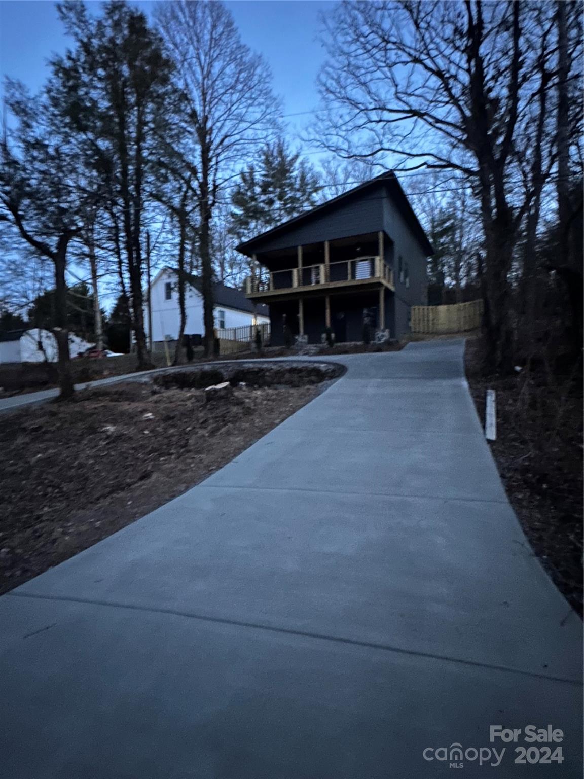 32 Access Road Black Mountain, NC 28711 - Photo 3 of 34 a front view of a house with a yard