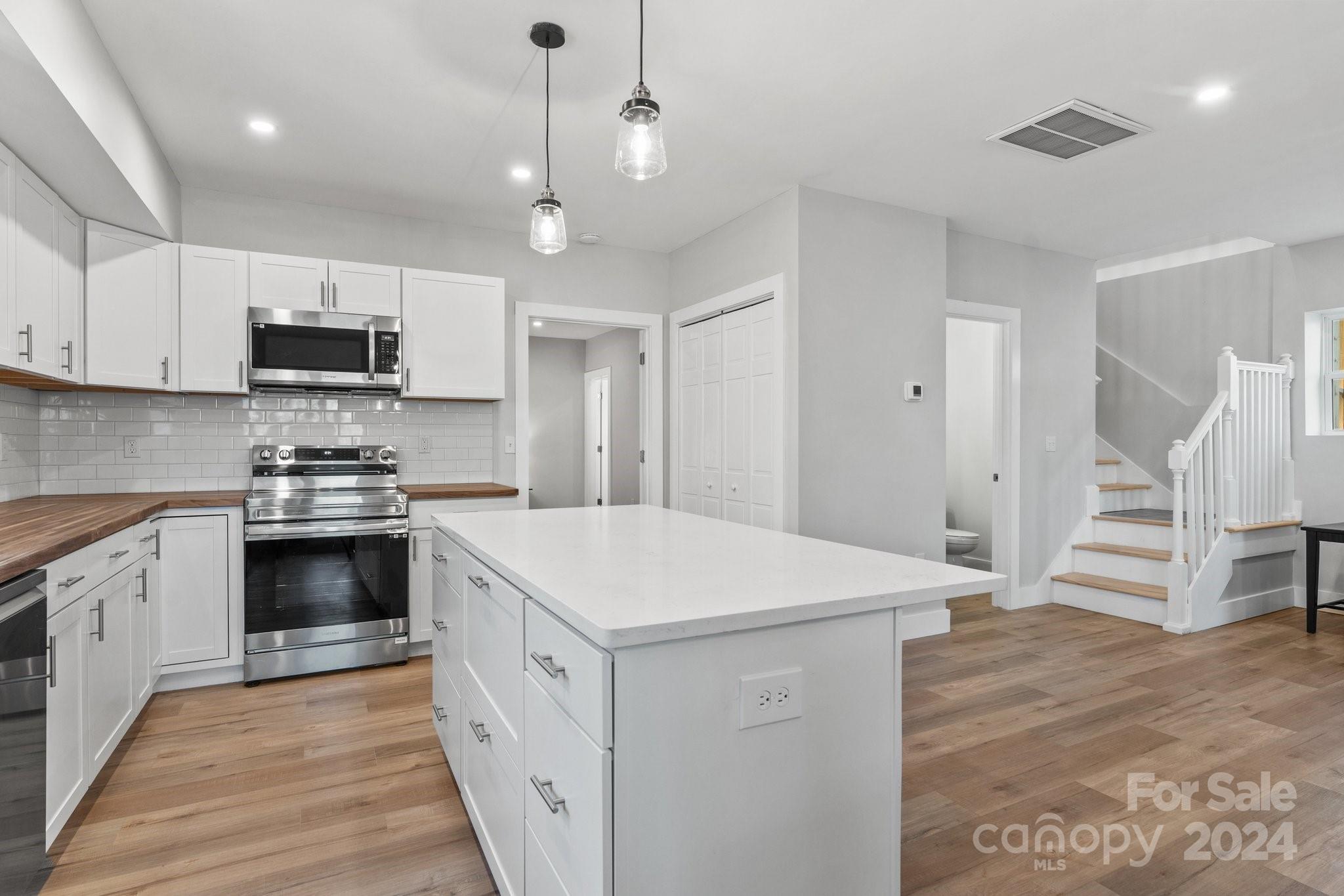32 Access Road Black Mountain, NC 28711 - Photo 7 of 34 a kitchen with a stove and a sink