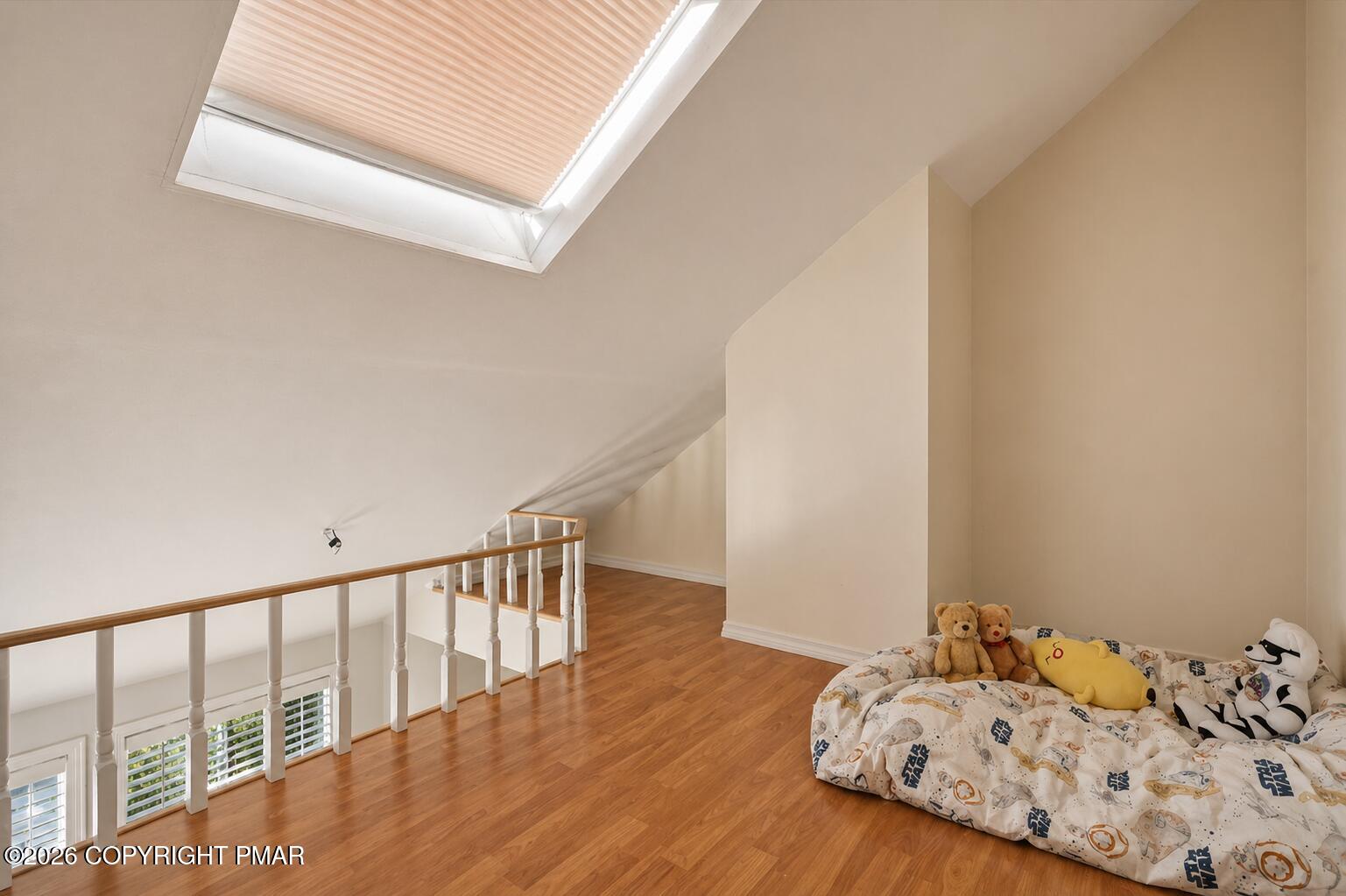 53 Barren Road East Stroudsburg, PA 18302 - Photo 21 of 57 a bedroom with a bed and wooden floor