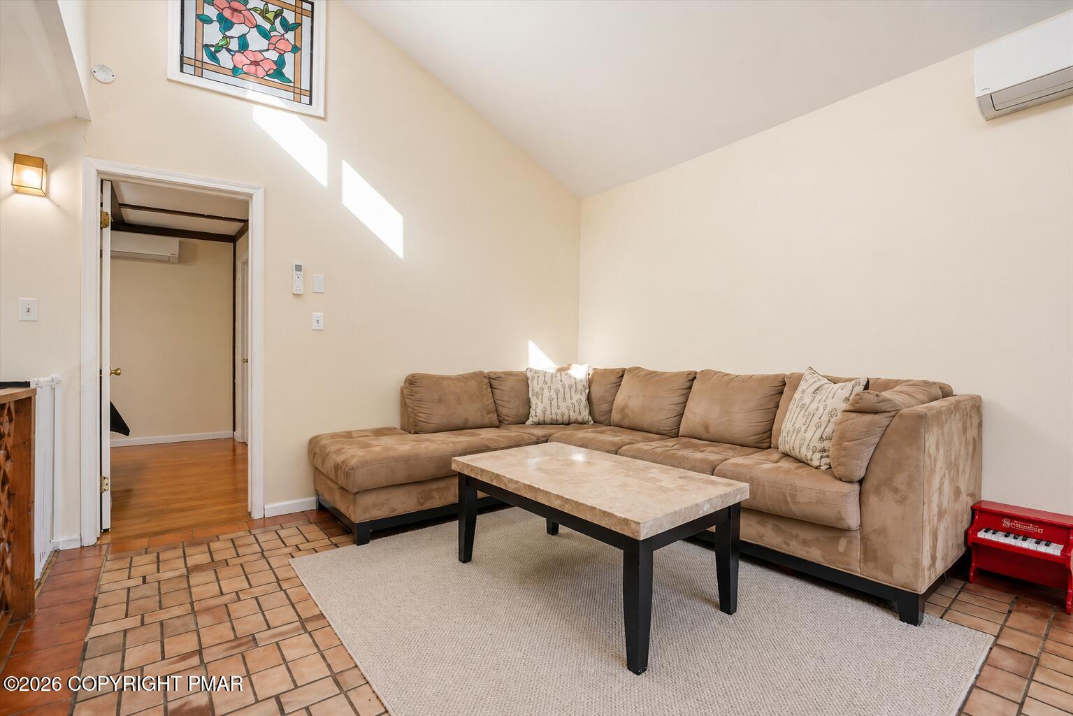53 Barren Road East Stroudsburg, PA 18302 - Photo 25 of 57 a living room with furniture and a rug