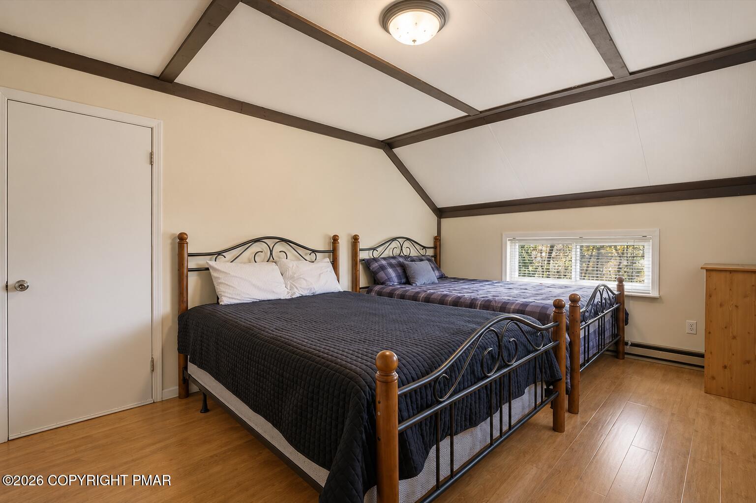 53 Barren Road East Stroudsburg, PA 18302 - Photo 27 of 57 a bed sitting in a bedroom next to a window