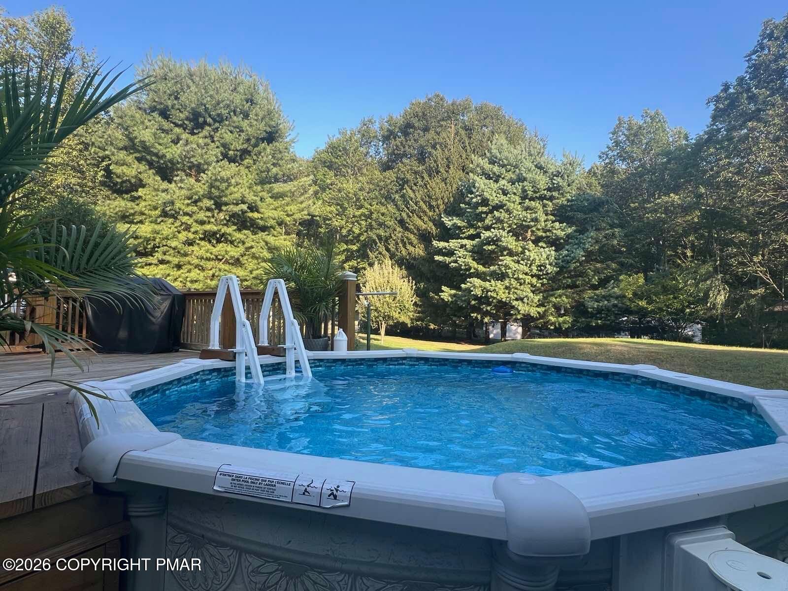 53 Barren Road East Stroudsburg, PA 18302 - Photo 56 of 57 a view of swimming pool with seating space