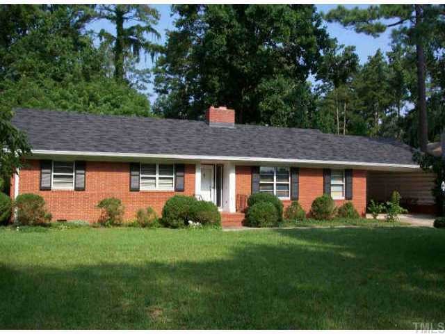 2309 Ridge Road Raleigh, NC 27612 - Photo 1 of 1 a front view of a house with garden
