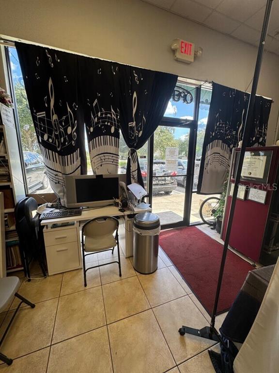 2050 Old Hickory Tree Road, Unit E St. Cloud, FL 34769 - Photo 2 of 10 a living room with furniture and window