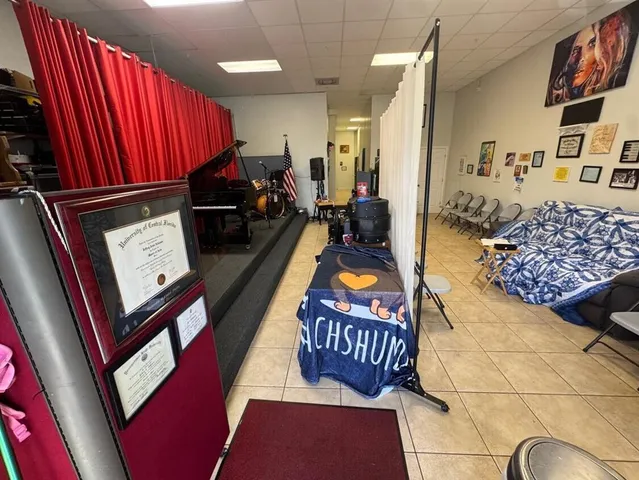 a view of a living room and dining room