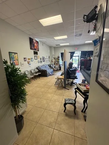a view of a livingroom with furniture and a rug