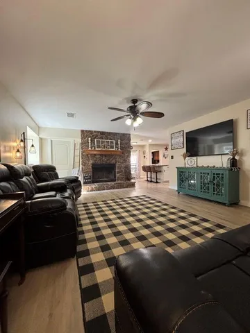 a kitchen with stainless steel appliances granite countertop a sink and a counter top space