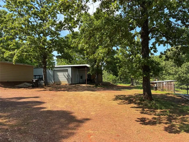 a front view of a house with a garage