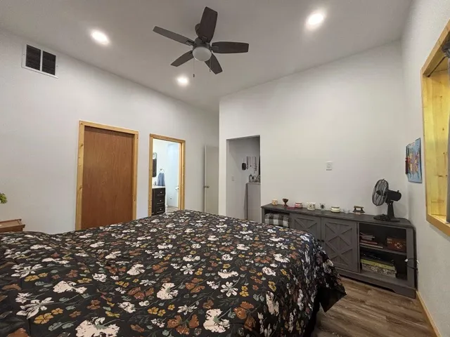 a bathroom with a double vanity sink and mirror
