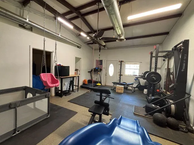 a view of a room with gym equipment