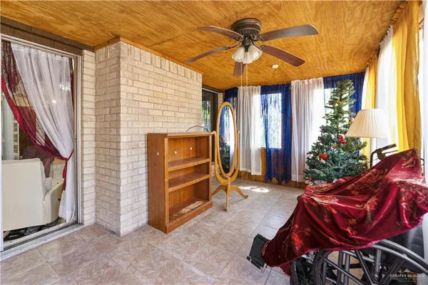 a view of a porch with seating space