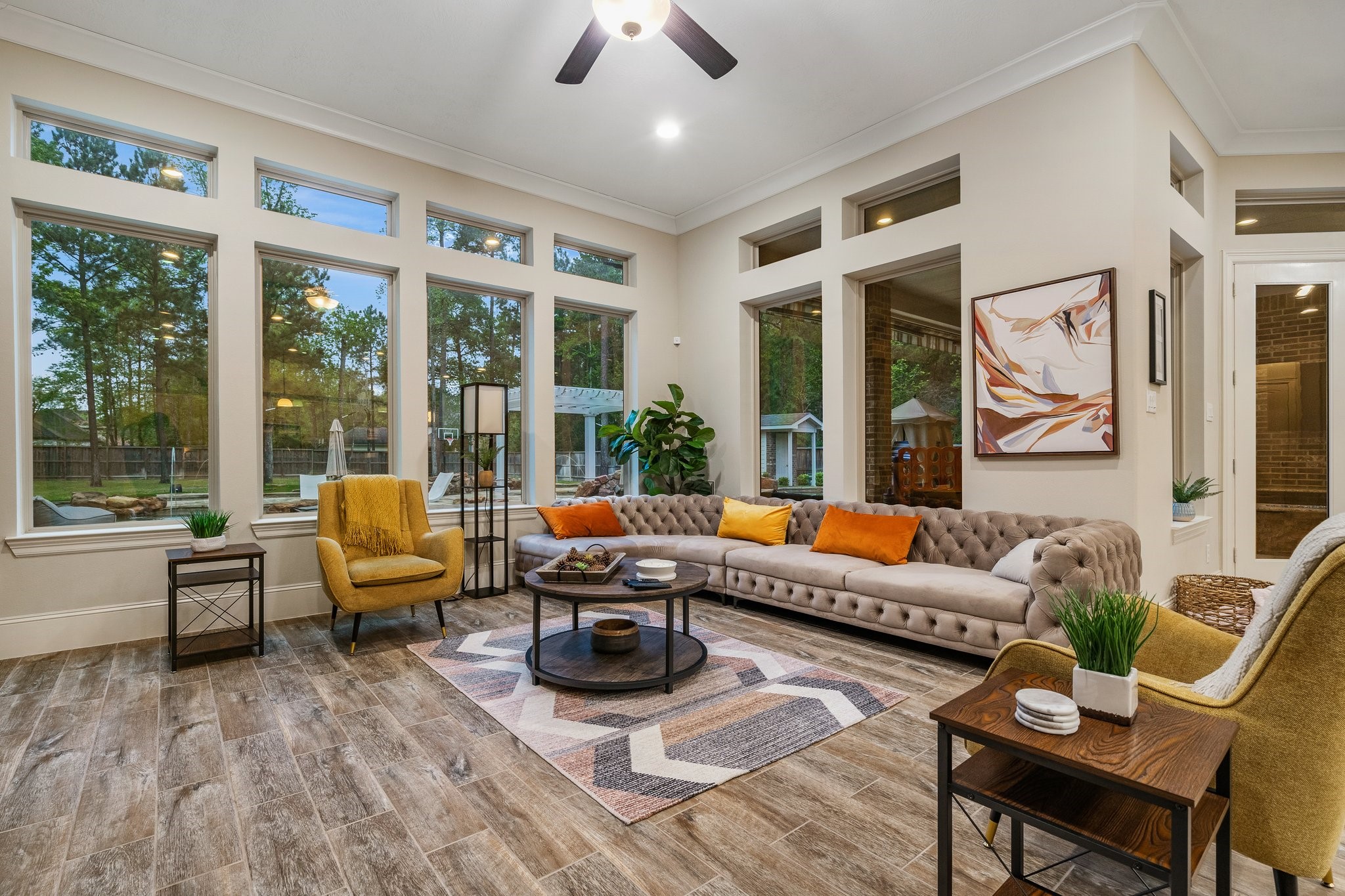 27411 Hazy Landing Court Spring, TX 77386 - Photo 17 of 50 a living room with furniture fireplace and large windows