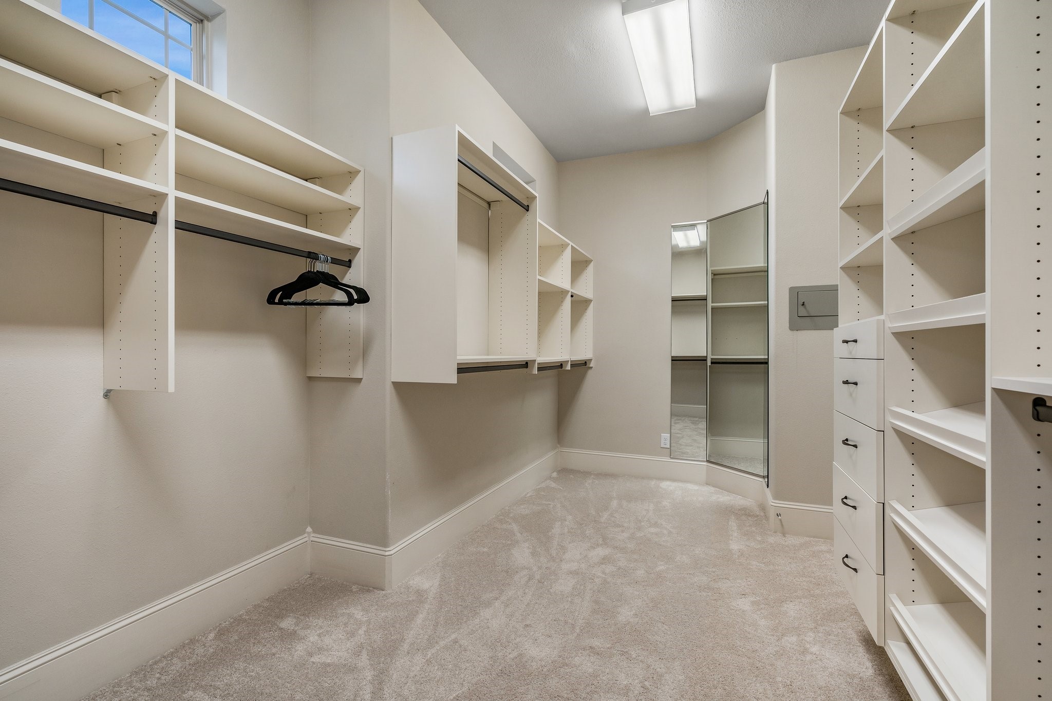 27411 Hazy Landing Court Spring, TX 77386 - Photo 28 of 50 a view of walk in closet with empty racks