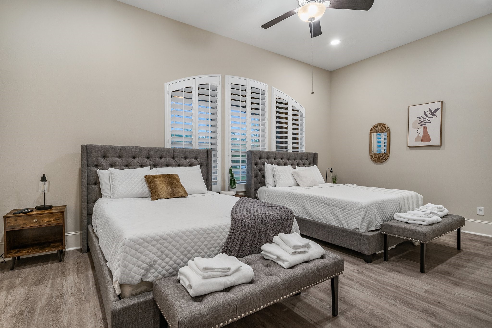 27411 Hazy Landing Court Spring, TX 77386 - Photo 30 of 50 a bedroom with a bed and a chandelier