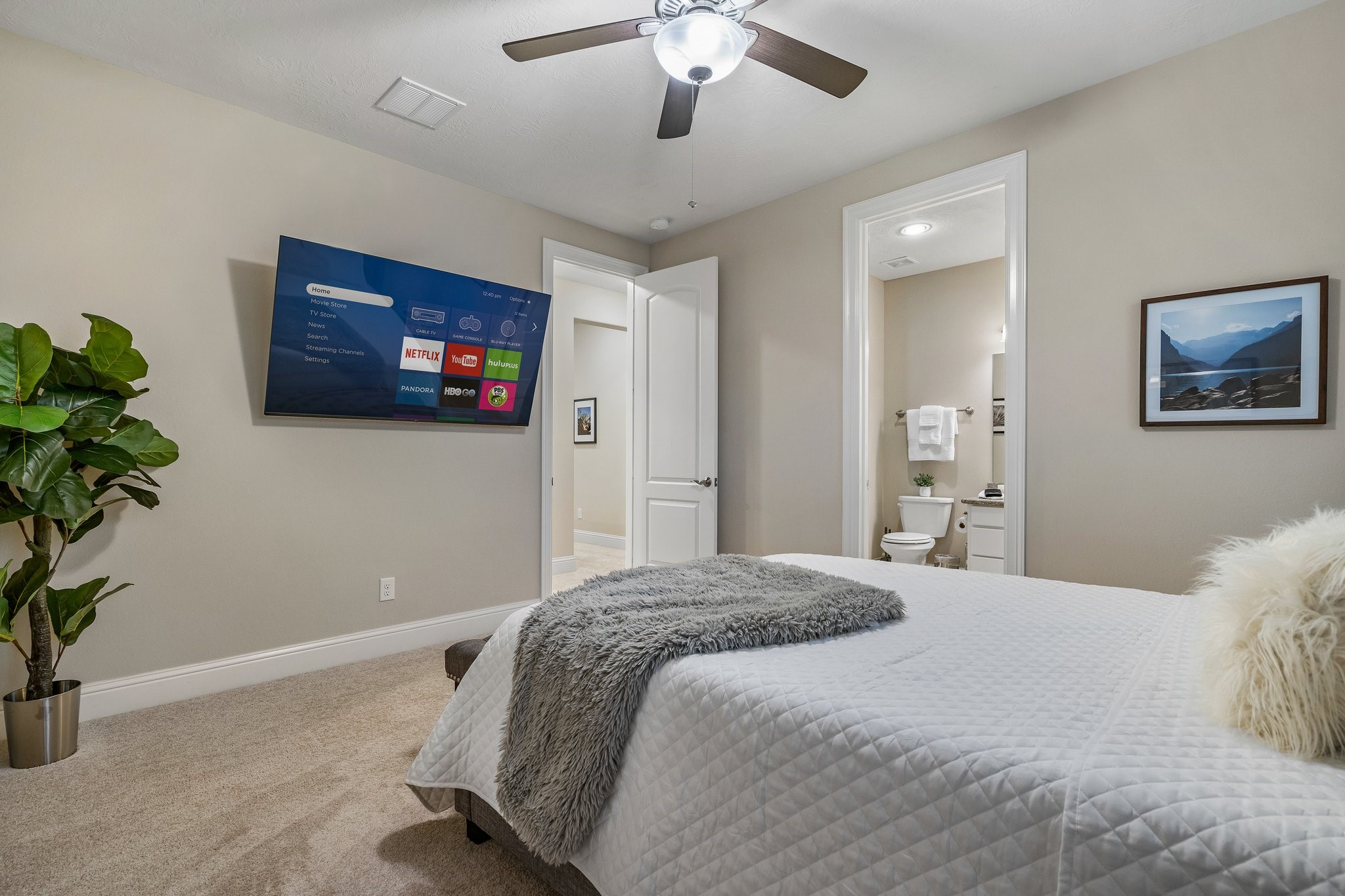 27411 Hazy Landing Court Spring, TX 77386 - Photo 41 of 50 a bedroom with a bed and a potted plant