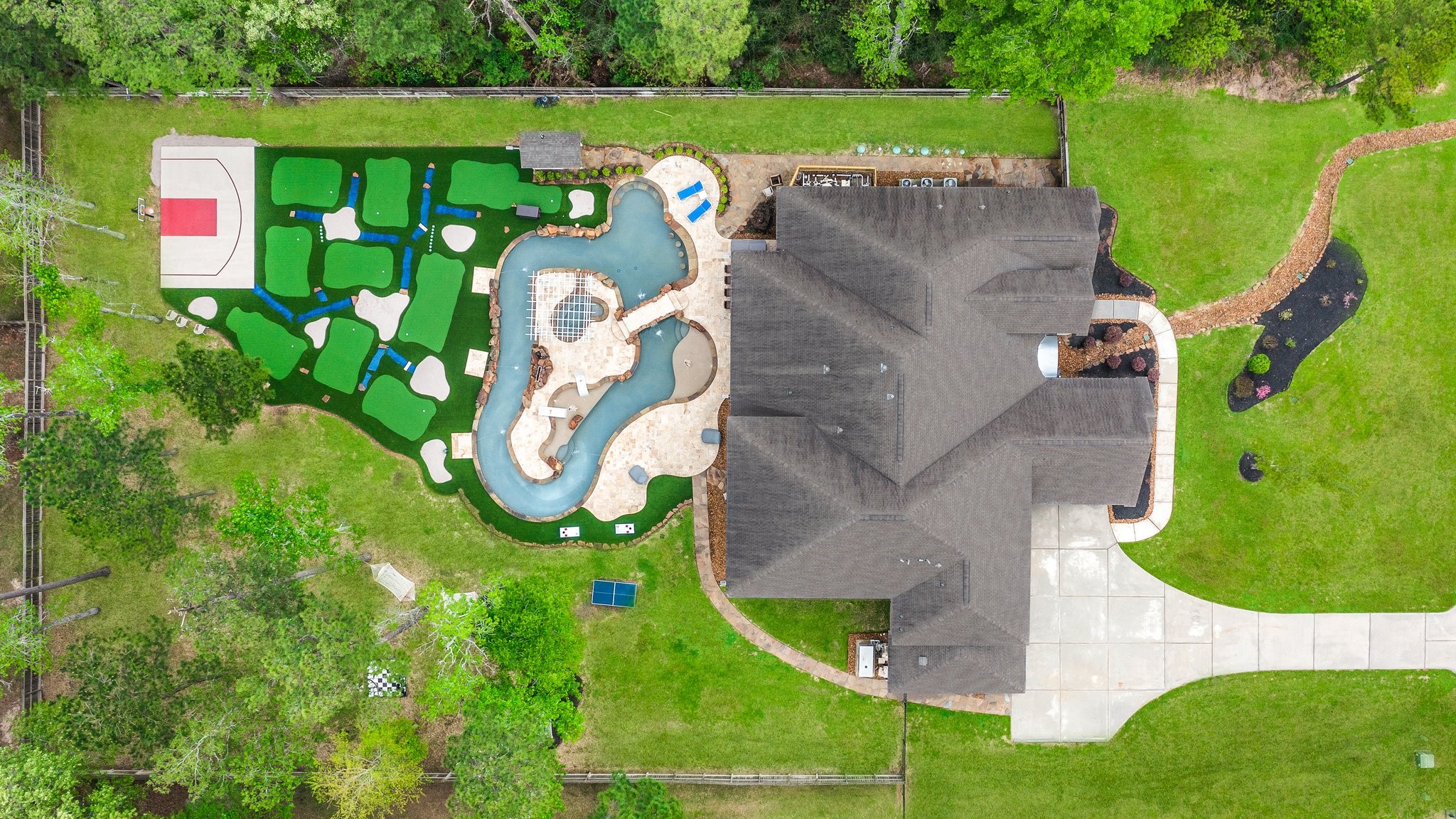 27411 Hazy Landing Court Spring, TX 77386 - Photo 45 of 50 an aerial view of a house with a garden
