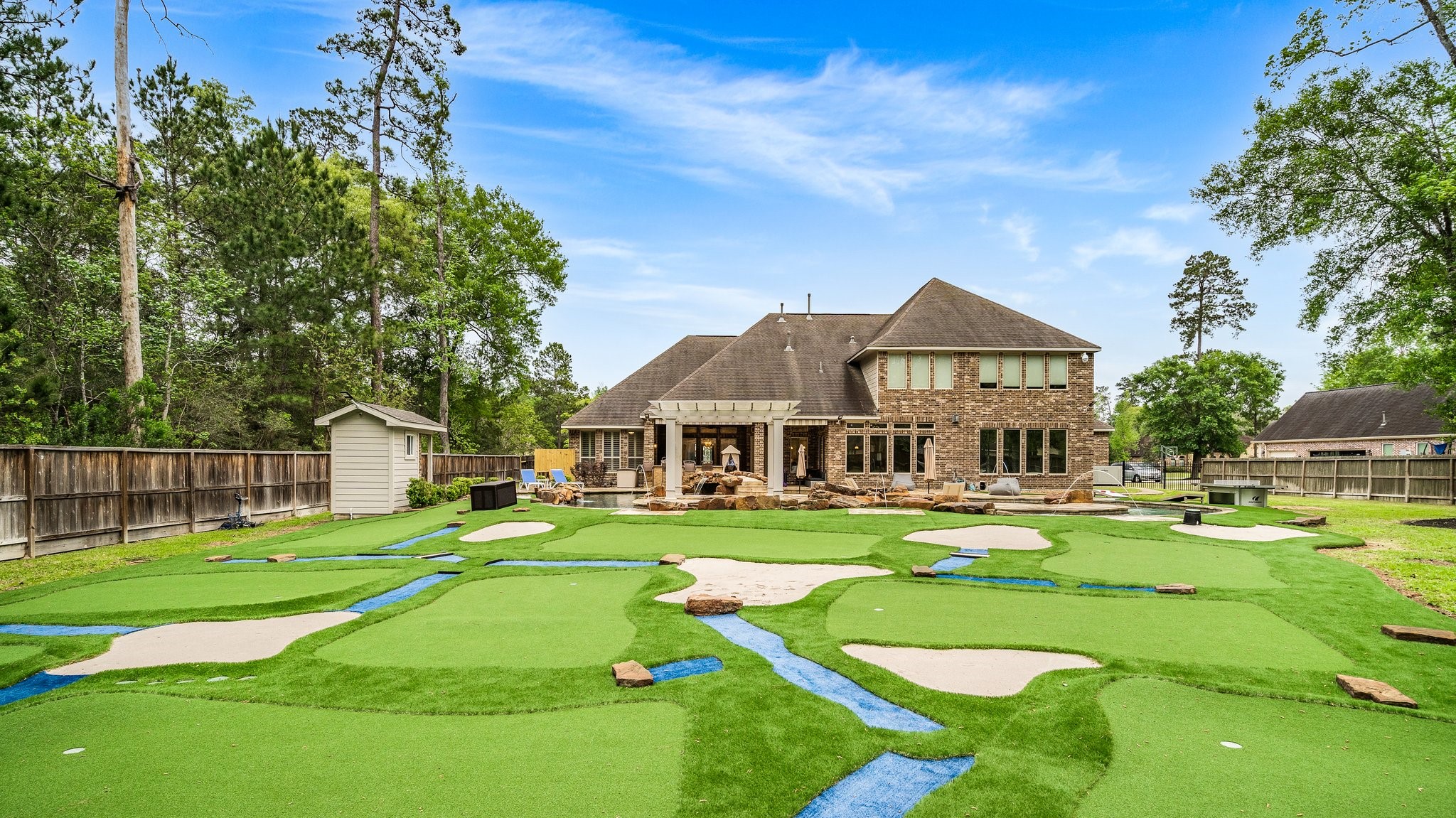 27411 Hazy Landing Court Spring, TX 77386 - Photo 49 of 50 a front view of a house with a big yard and trees