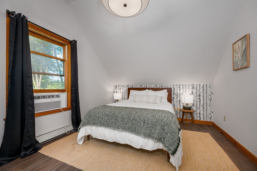 124 East Hawley Road Hawley, MA 01339 - Photo 16 of 39 a bedroom with a bed and window