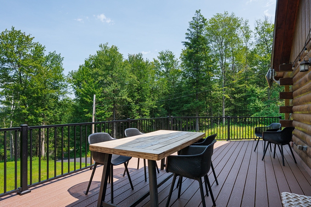 124 East Hawley Road Hawley, MA 01339 - Photo 23 of 39 a view of a table and chairs on the roof deck