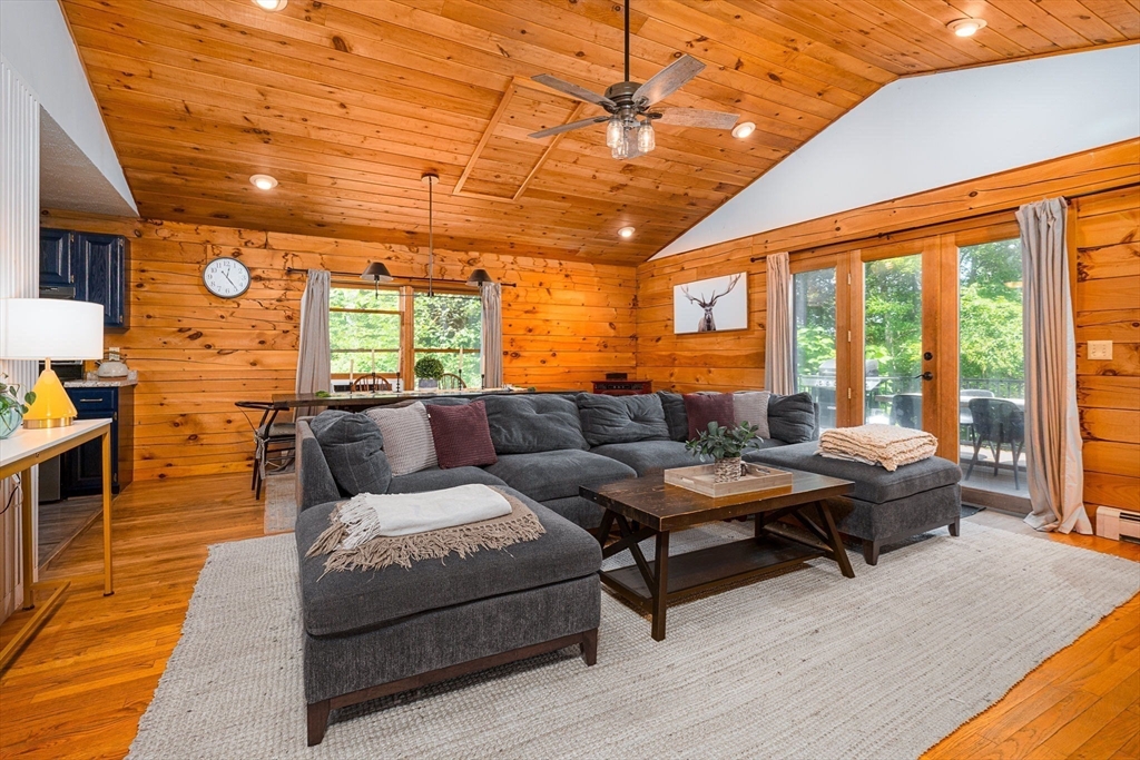 124 East Hawley Road Hawley, MA 01339 - Photo 8 of 39 a living room with furniture and large windows