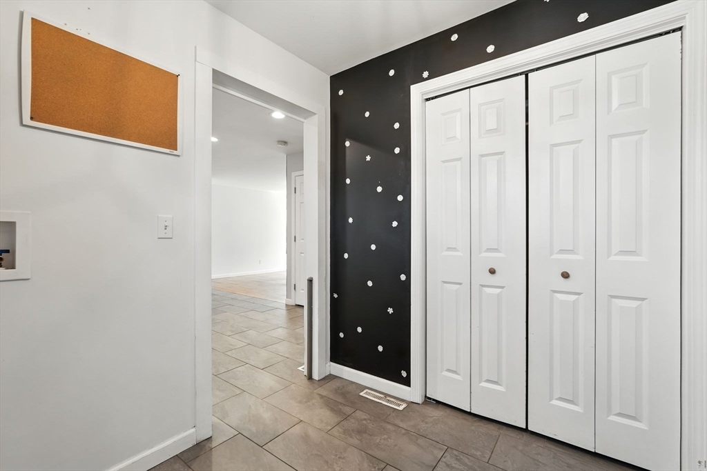 24 Porter Street Springfield, MA 01104 - Photo 19 of 42 a bathroom with a shower and a glass door