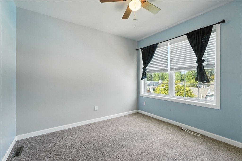 24 Porter Street Springfield, MA 01104 - Photo 28 of 42 an empty room with a window