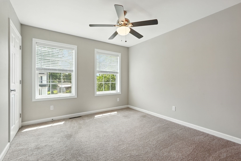 24 Porter Street Springfield, MA 01104 - Photo 30 of 42 a view of an empty room with a window