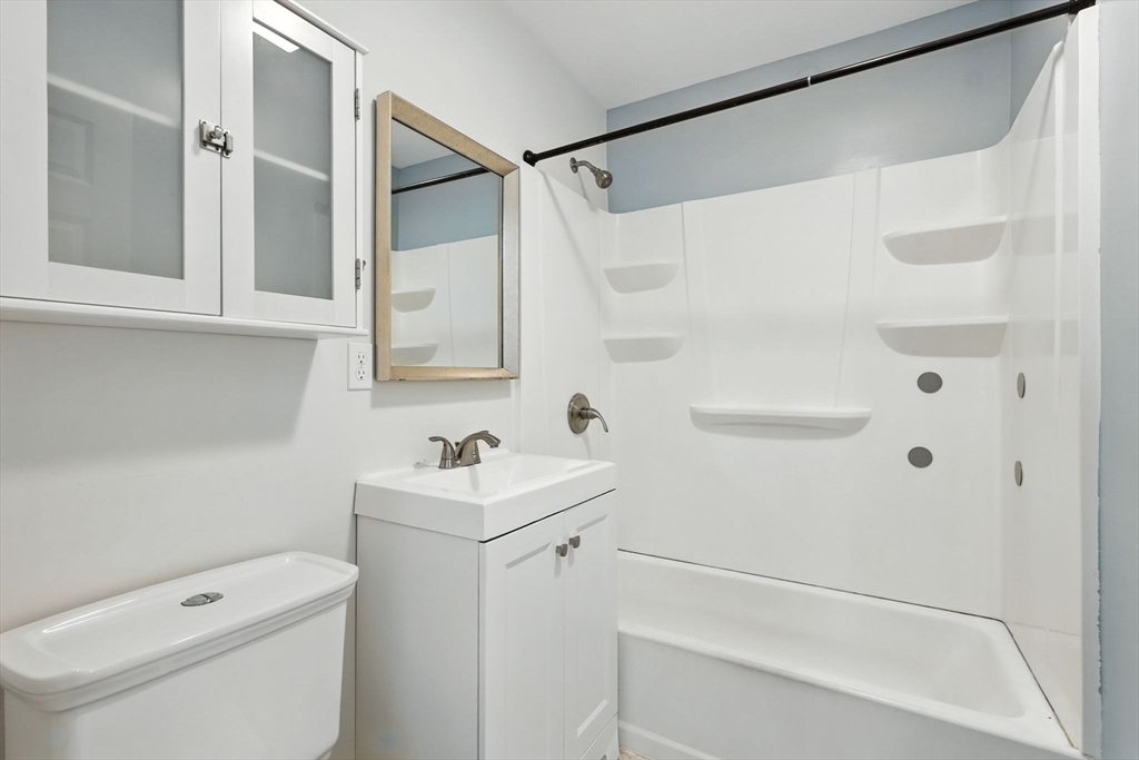 24 Porter Street Springfield, MA 01104 - Photo 32 of 42 a bathroom with a sink a toilet and shower