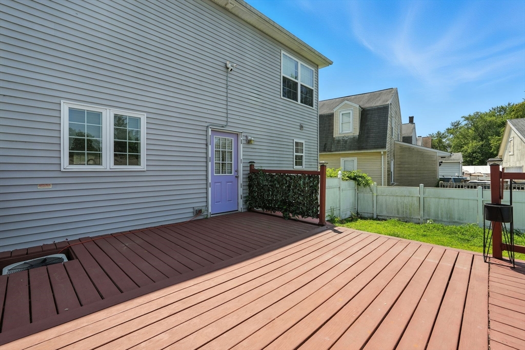 24 Porter Street Springfield, MA 01104 - Photo 36 of 42 a view of a backyard with wooden floor