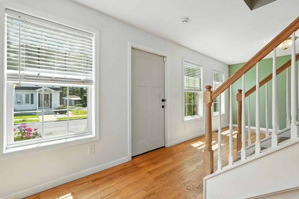 24 Porter Street Springfield, MA 01104 - Photo 6 of 42 a view of an entryway with wooden floor and door