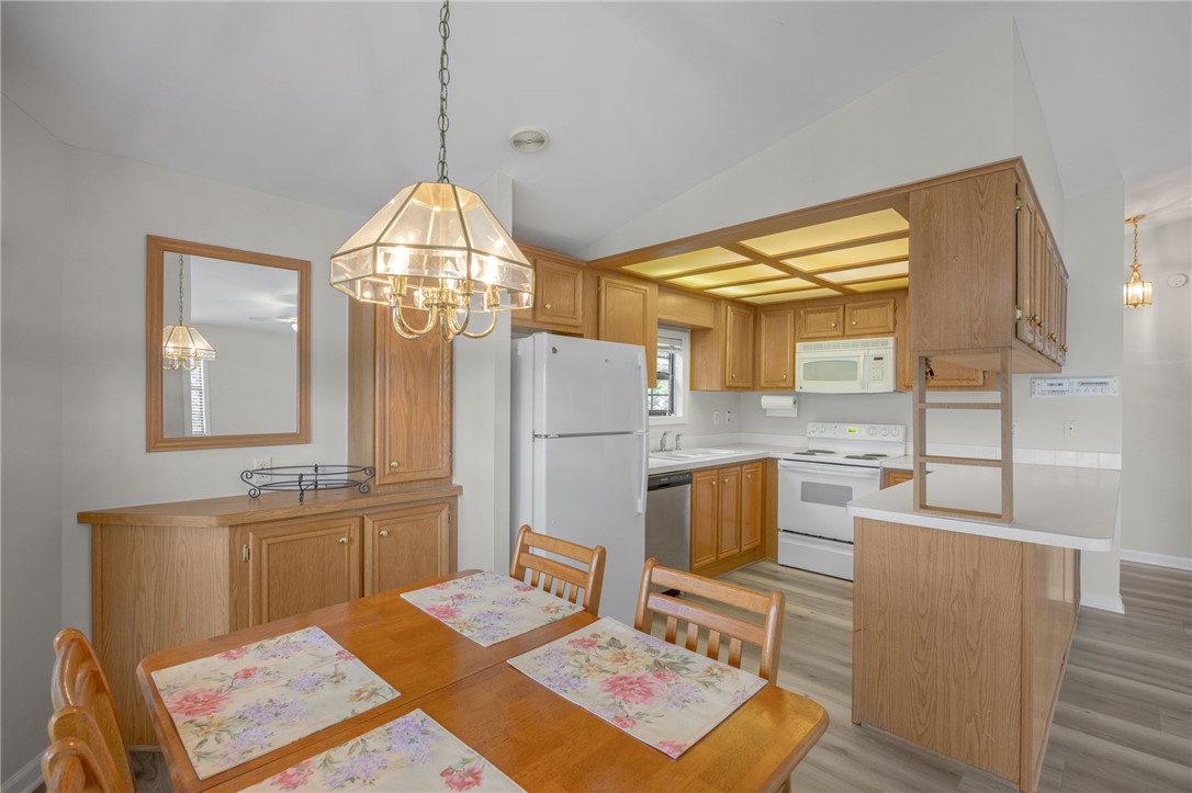 1230 Melton Road, Unit 25 West Union, SC 29696 - Photo 7 of 46 A well-appointed kitchen and dining area provides everyday comfort and function.