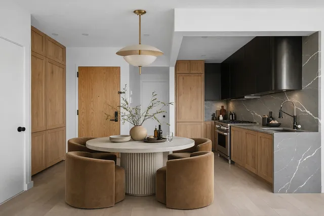 a kitchen with stainless steel appliances granite countertop a sink a stove and a refrigerator