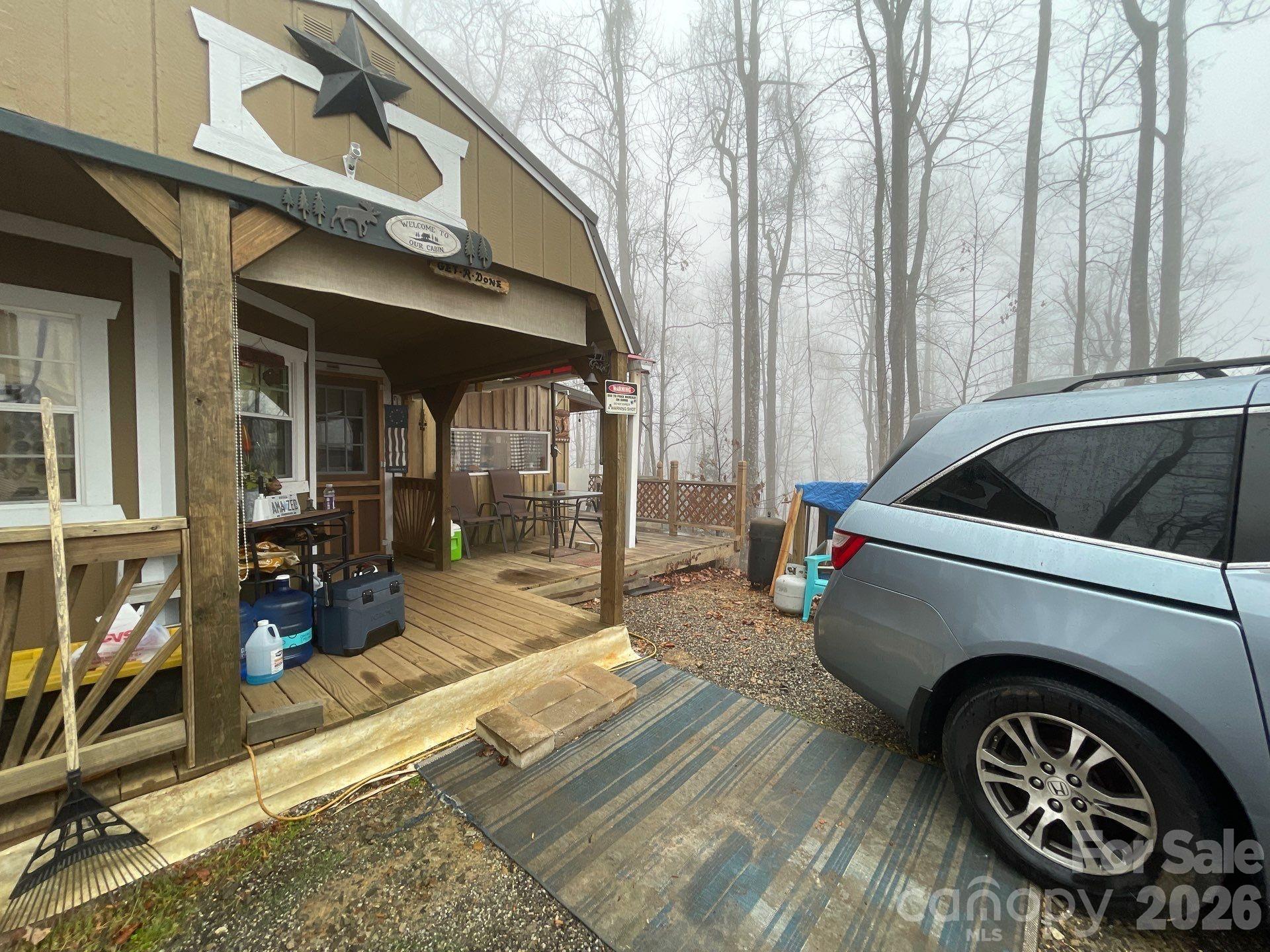293 Dogwood Road Moravian Falls, NC 28654 - Photo 2 of 13 a view of a car park in front of building