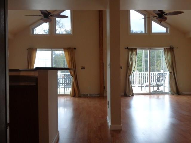 363 Pine Hollow Road Level Green, PA 15085 - Photo 3 of 25 Double Glass Door Sets and Trapezoid Window Sets provide Sunset Glory through Main Living Areas!