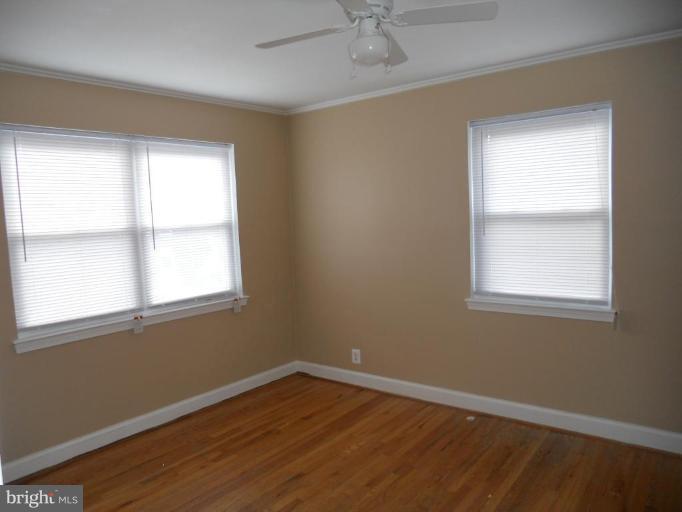 844 Bradhurst Road Baltimore, MD 21212 - Photo 16 of 17 an empty room with a window