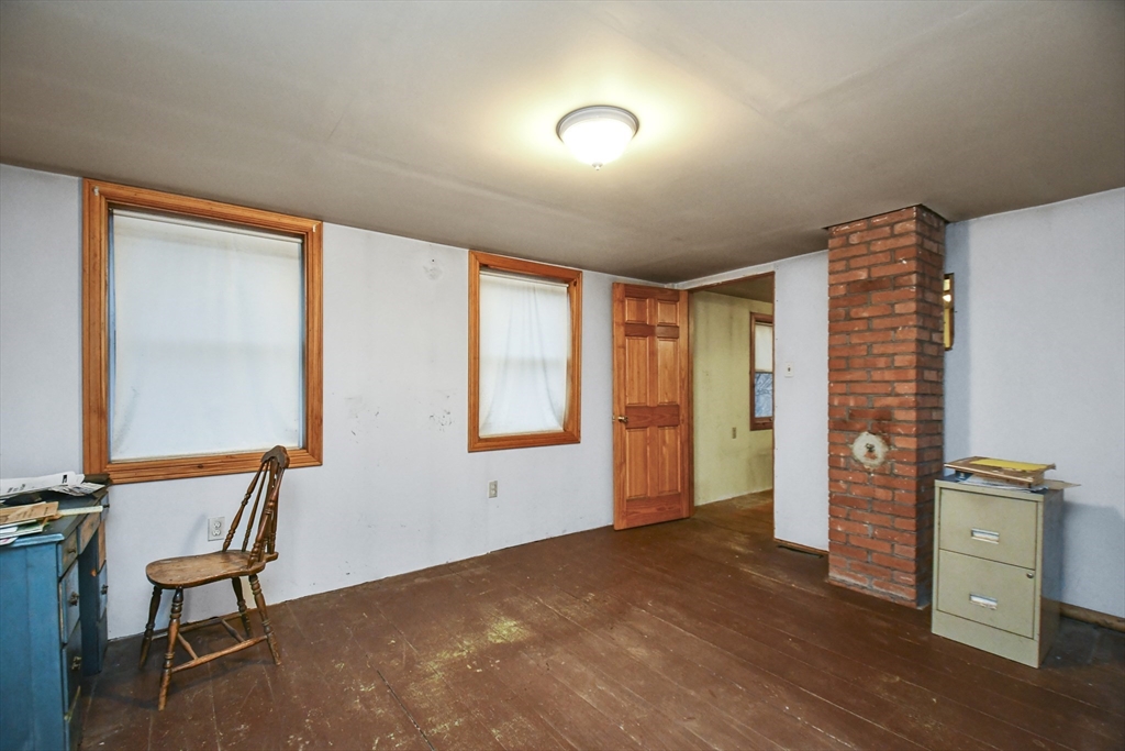 56 Pine Hill Road Orange, MA 01364 - Photo 11 of 30 a view of an empty room with a window