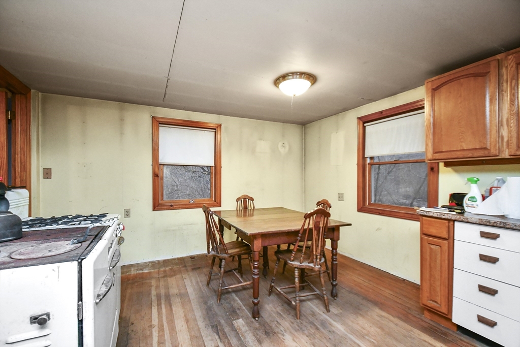 56 Pine Hill Road Orange, MA 01364 - Photo 17 of 30 a view of a dining room with furniture and window