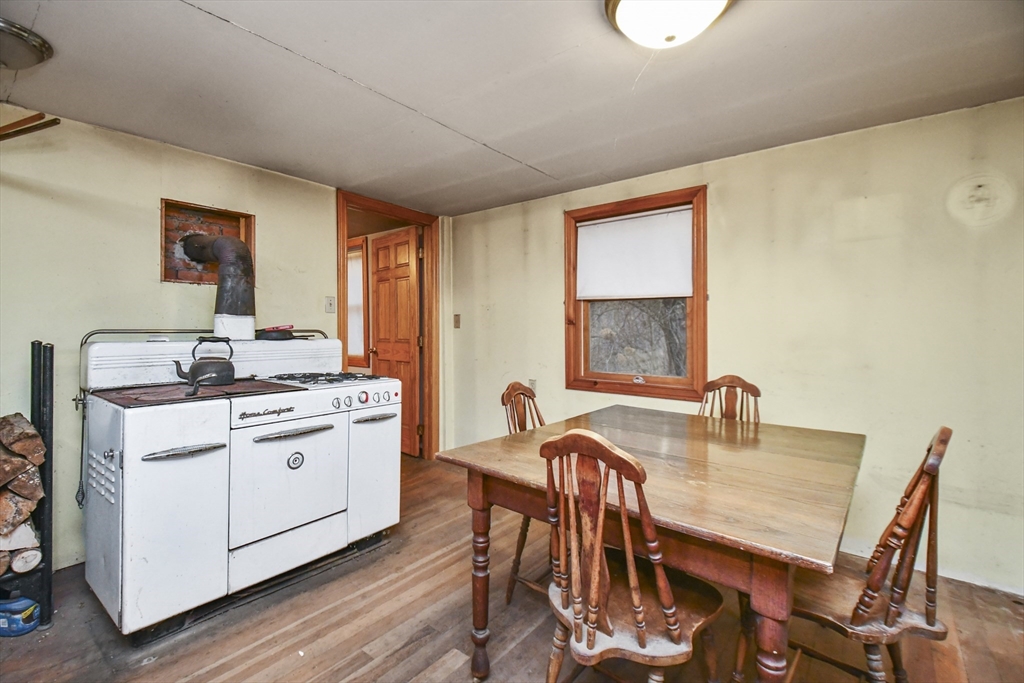 56 Pine Hill Road Orange, MA 01364 - Photo 18 of 30 a dining room with furniture and window