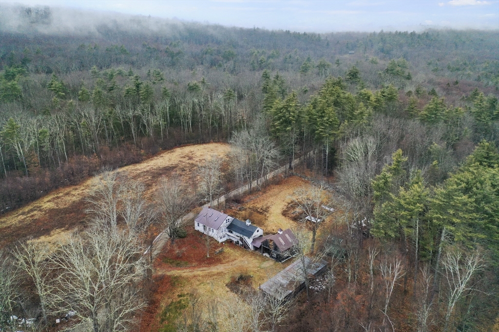 56 Pine Hill Road Orange, MA 01364 - Photo 25 of 30 a view of a lake from a yard
