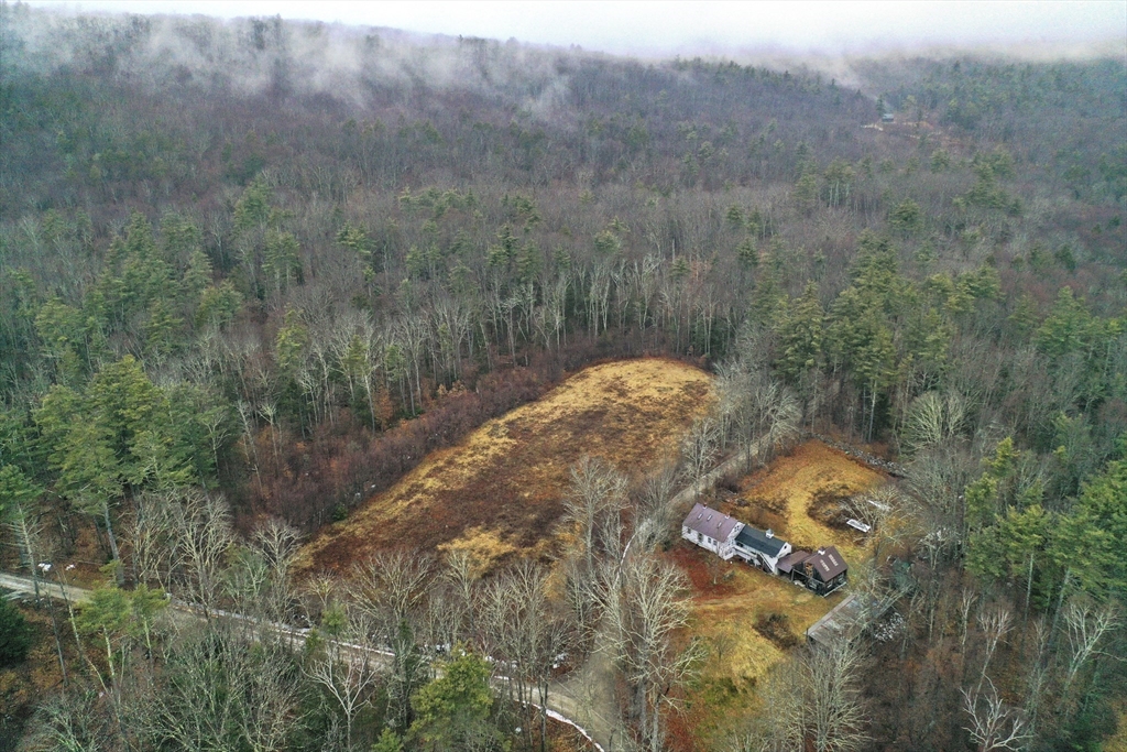 56 Pine Hill Road Orange, MA 01364 - Photo 29 of 30 a view of a house with a yard