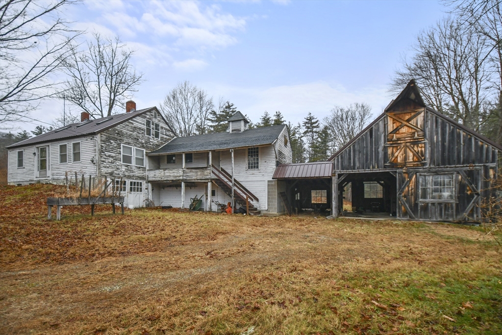 56 Pine Hill Road Orange, MA 01364 - Photo 3 of 30 a view of a house with roof deck