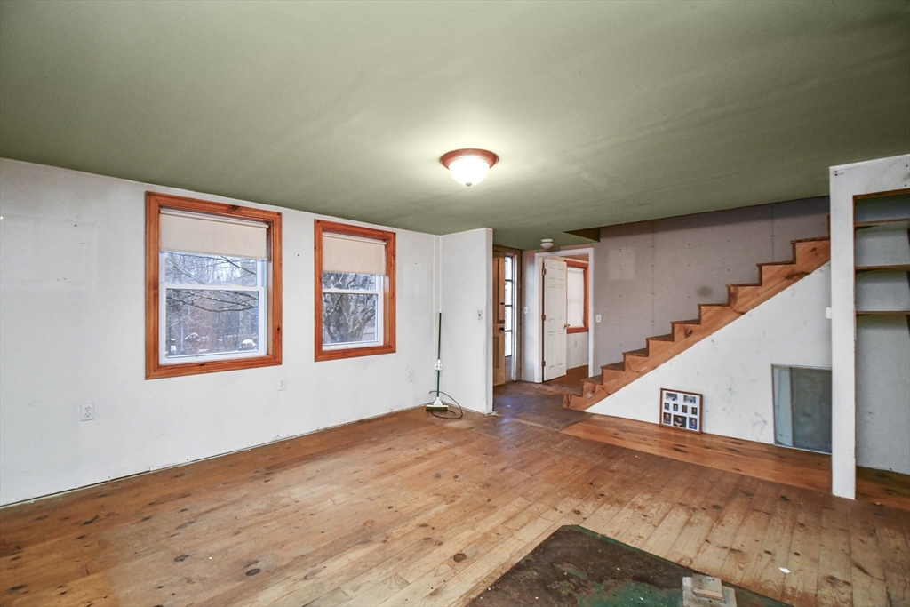 56 Pine Hill Road Orange, MA 01364 - Photo 7 of 30 a view of an entryway with staircase