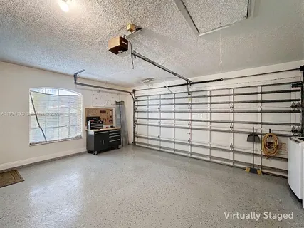a view of a garage room and a window