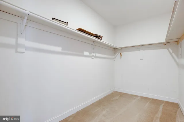 a large spacious bathroom with a large tub and sink