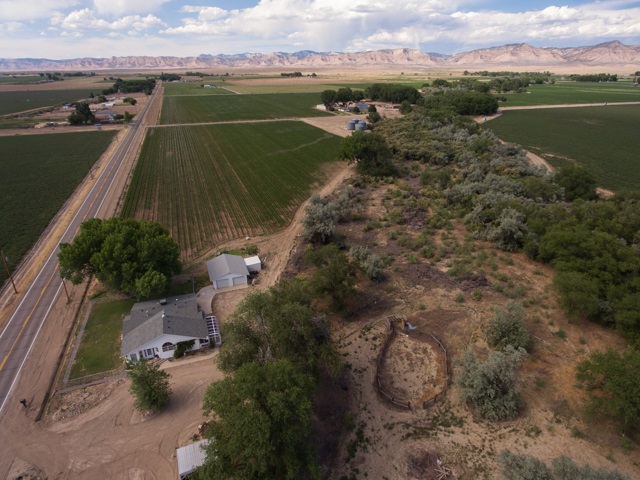 1280 20 Road Fruita, CO 81521 - Photo 11 of 41 a view of a lake with a mountain
